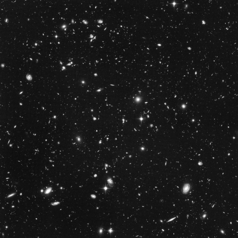 Hubble ultra-deep field image in visible light, grayscale.